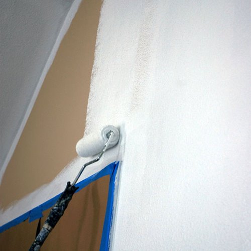 Priming wall with roller brush