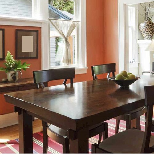 Orange rust style dining room
