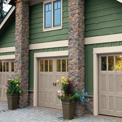 Moss Green Exterior with Light Tan Garage Doors