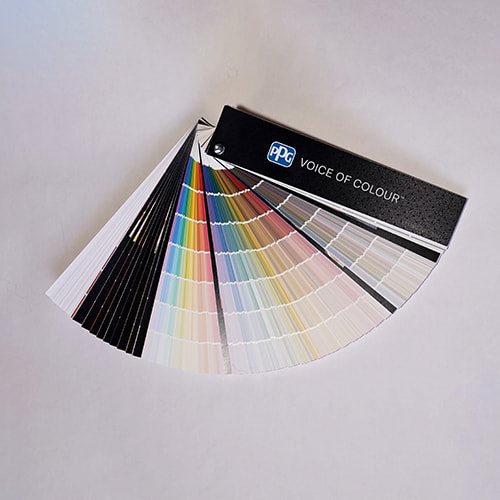 Spread array of colored gradient swatches on white surface