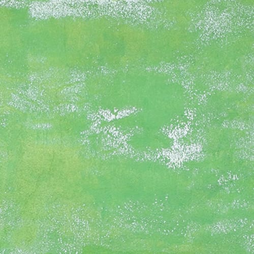 White speckles on green surface