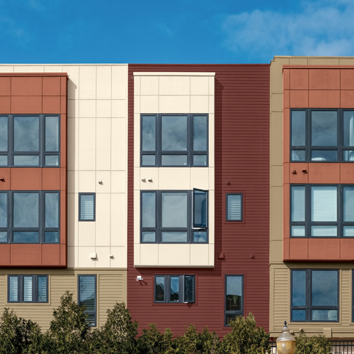 Multi-family home exterior with blue skies