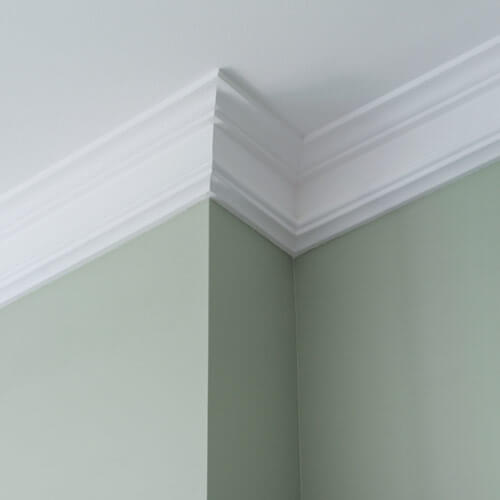 Picture of clean wall and ceiling with trim